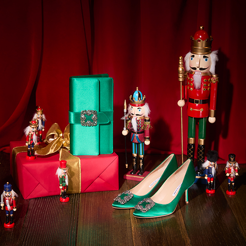 Image of a green embellished shoe and matching clutch bag.